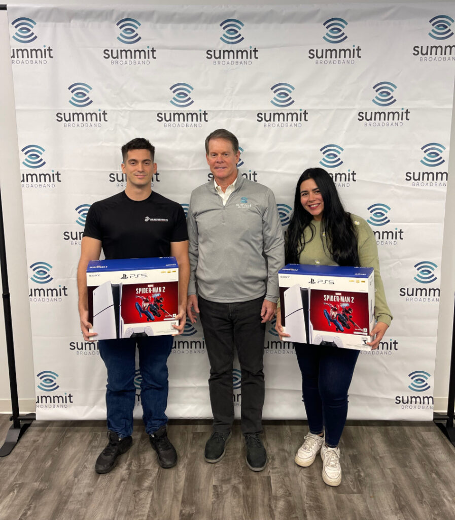 Summit Broadband holiday contest winners with their prizes (PlayStation 5s).